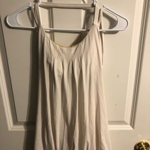 White strappy lululemon tank top with built-in bra